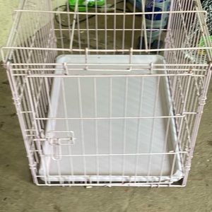 Pink small dog crate